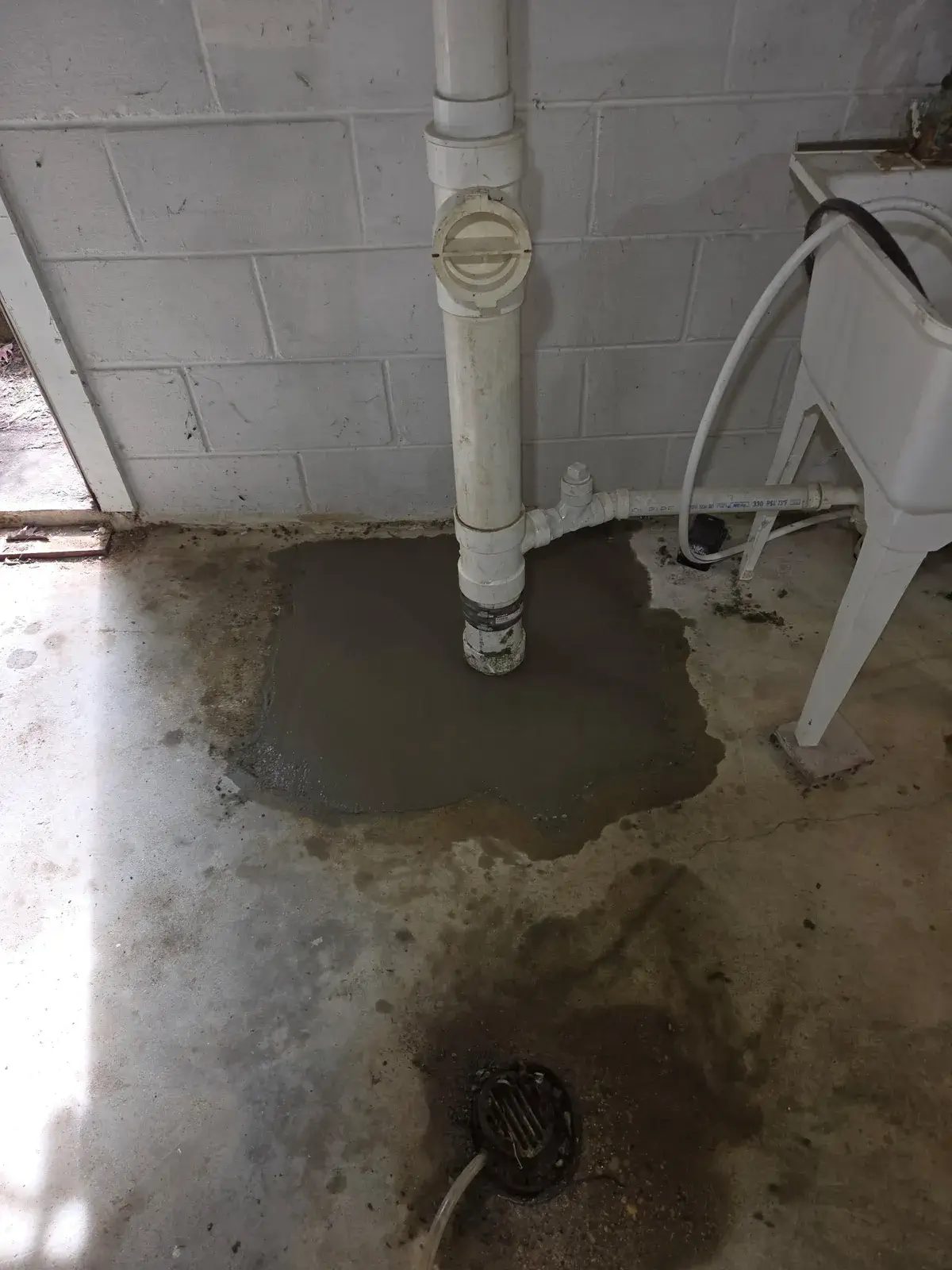 Sewage backup pooling in a Milwaukee basement floor